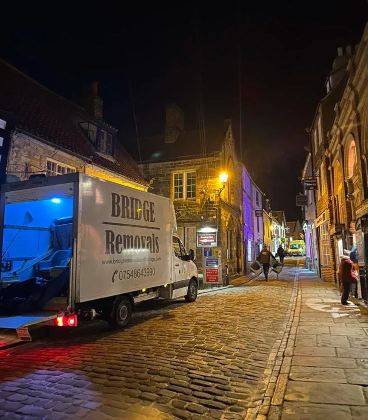 Night-Time Finish on a Cobbled Street Bridge Removals van parked on a cobbled street at night, a late finish to a house removal.