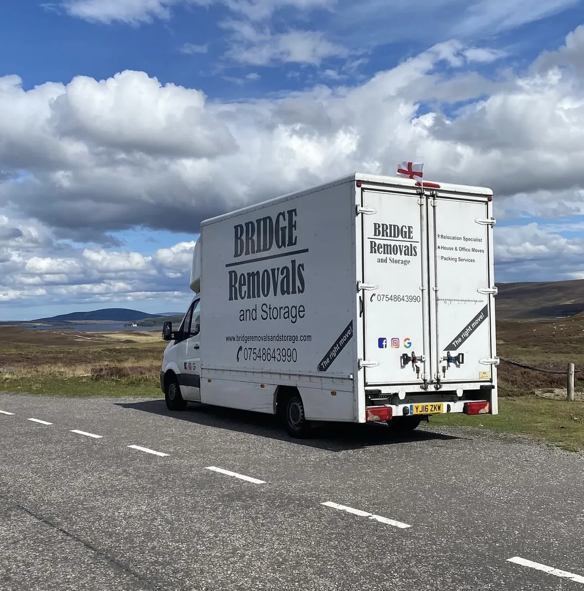 Long Distance Move Through The Highlands Bridge Removals van on a moorland road in the Scottish Highlands during a long-distance removals job.