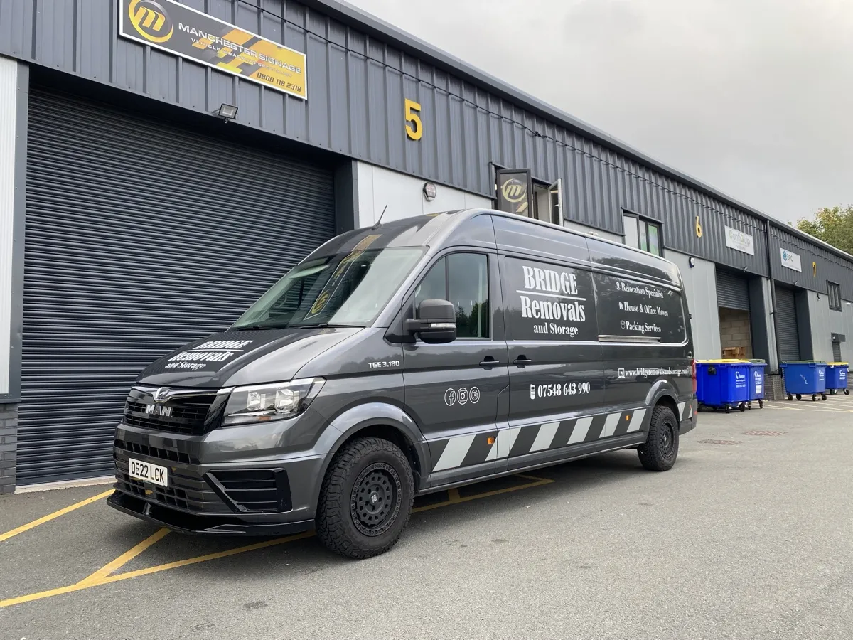 Bridge Removals TGE van with full livery parked outside the Manchester Signage unit